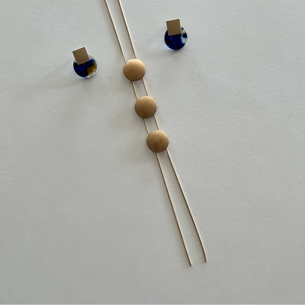 A New Day | Matte gold bolero-style medallion necklace & blue lucite earrings